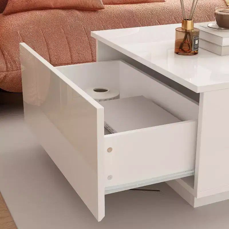 Table basse à LED blanc laqué avec rangements multi-zones, tiroir et compartiments ouverts