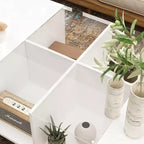 Table basse à LED blanc laqué avec rangements multi-zones, tiroir et compartiments ouverts