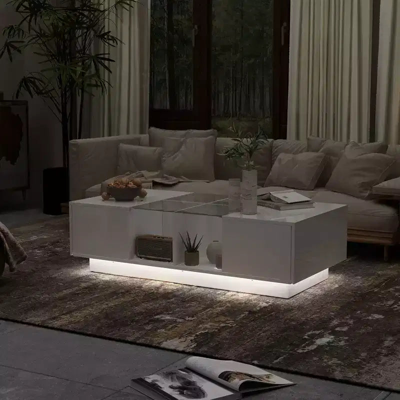 Table basse à LED blanc laqué avec rangements multi-zones, tiroir et compartiments ouverts